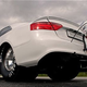 Illustration for article titled Watch an Audi A5 transform into a drag car